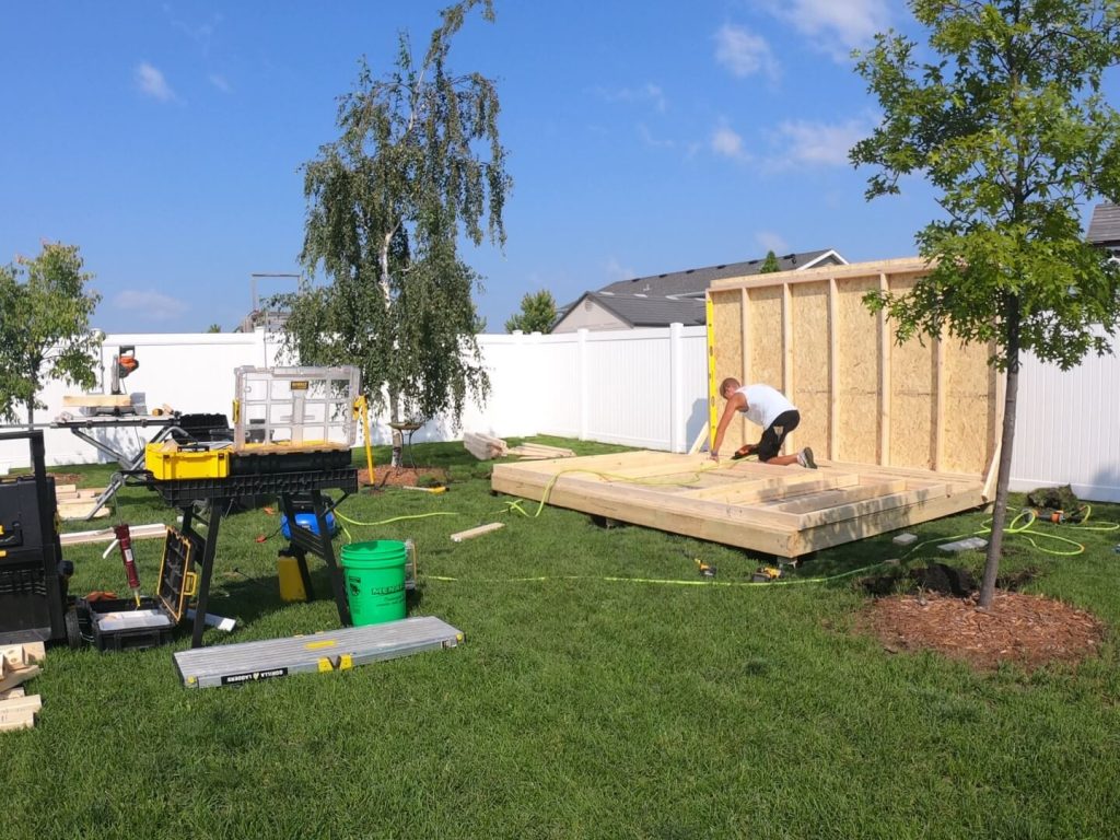 Custom shed being assembled on site.