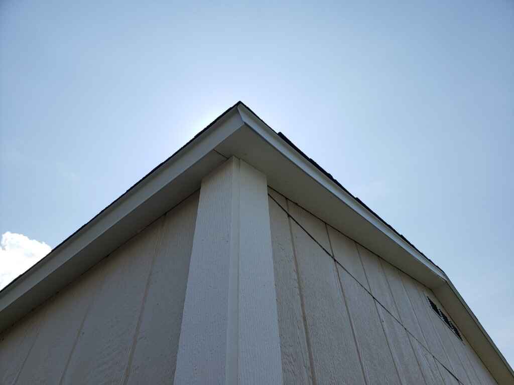 Custom shed roof overhangs built on site.