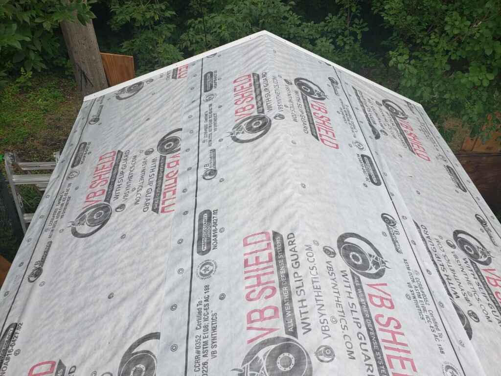 Roofing underlayment to protect storage shed.