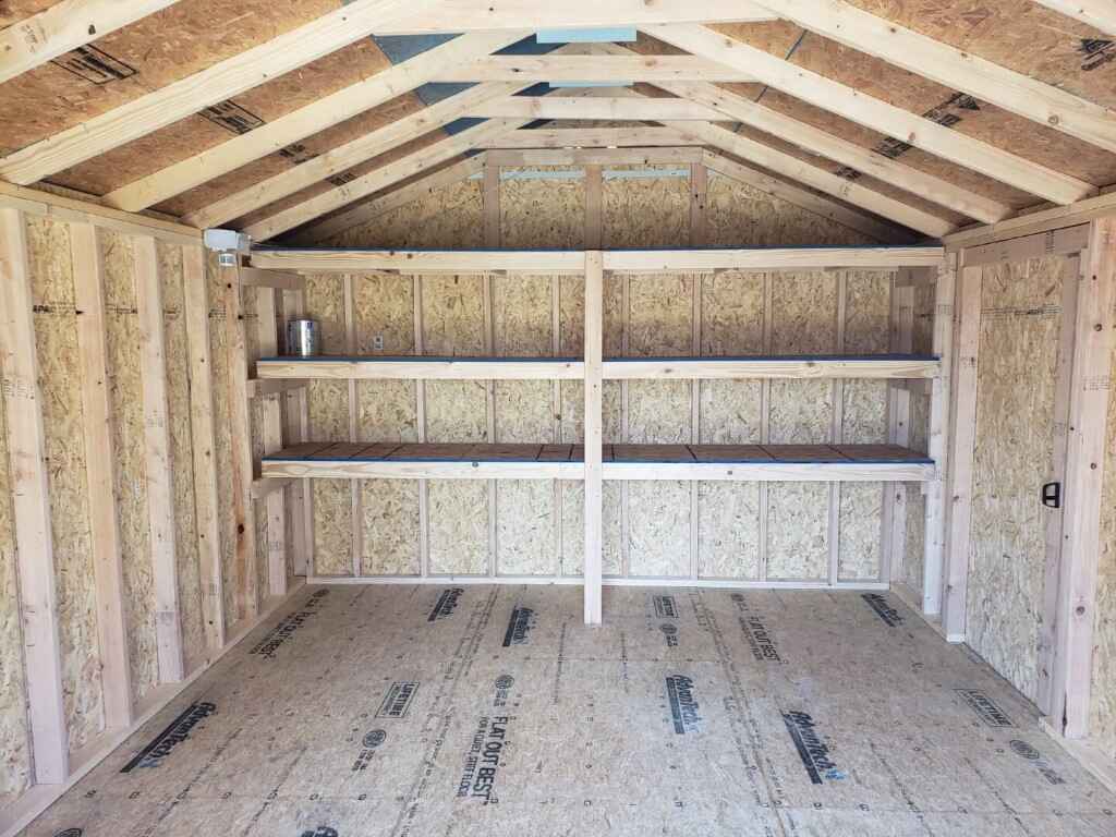 Custom storage shed with 3 tiered shelving, built on site