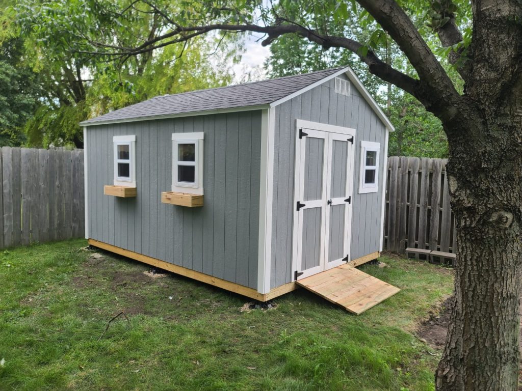 custom shed with flower boxes